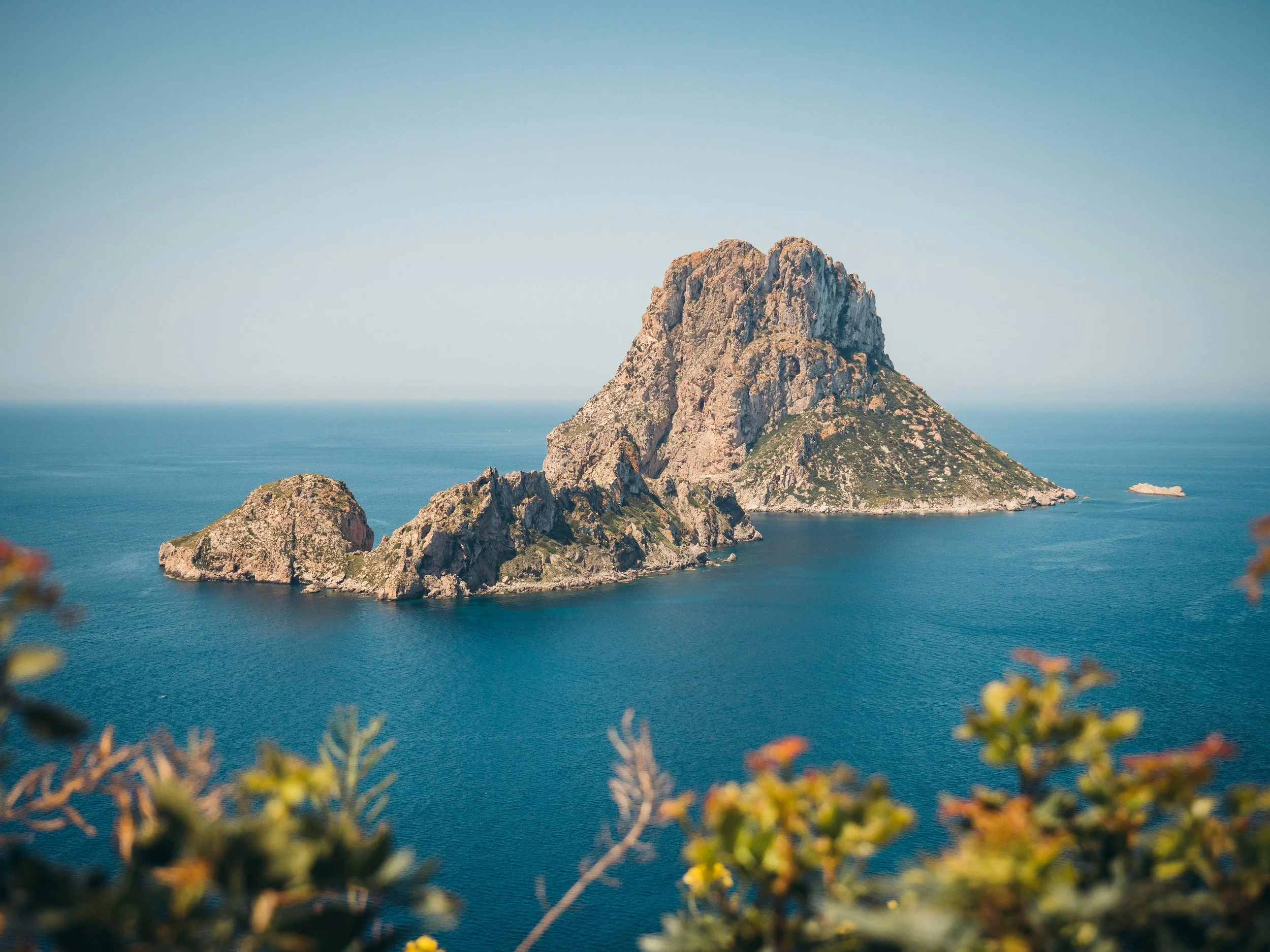 Es Vedrà rising from the blue sea off Ibiza