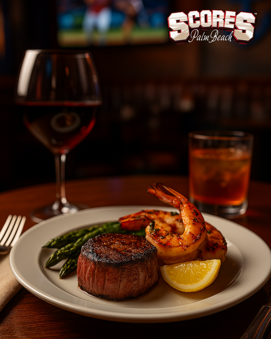 Surf and turf plate with steak and shrimp at Scores Palm Beach