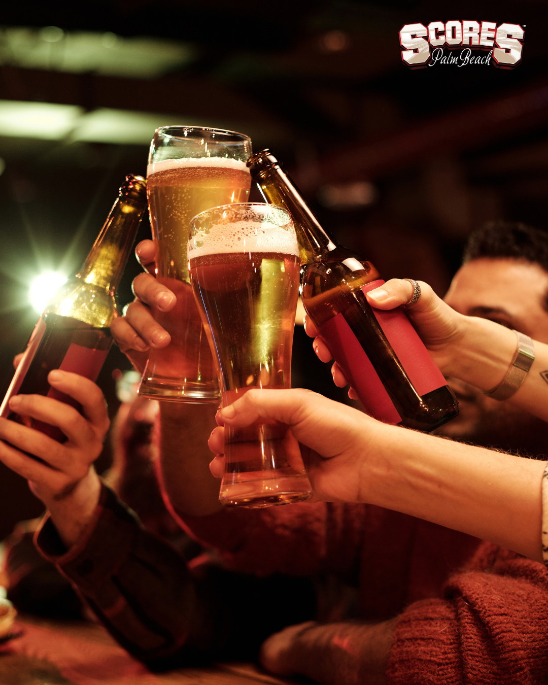 VIP celebration at Scores Palm Beach featuring bottle service, entertainers, and private booths for unforgettable bachelor and birthday parties in West Palm Beach.