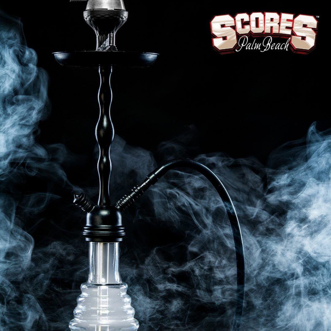Hookah lounge experience at Scores Palm Beach with elegant lighting, bottle service, and upscale nightlife vibes.