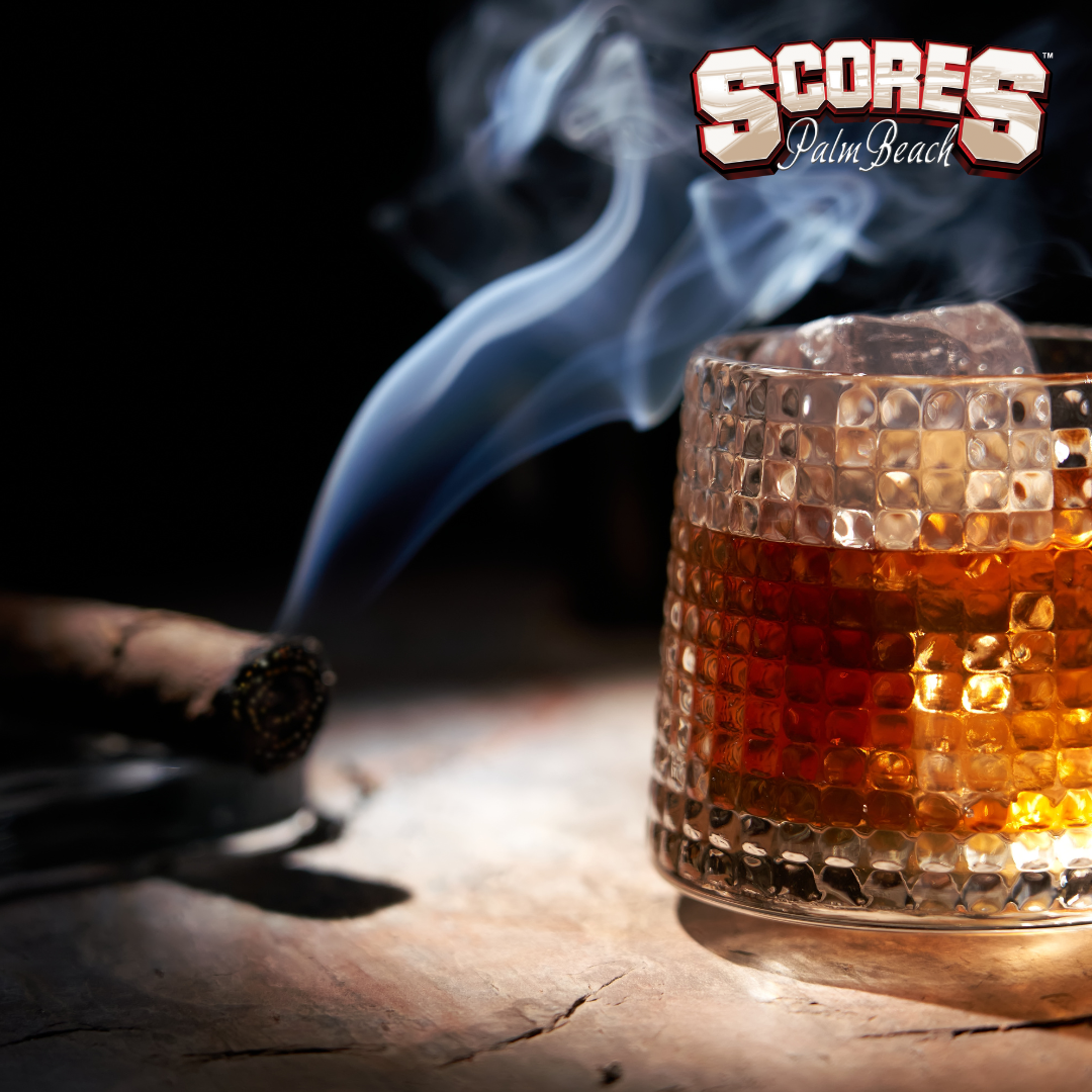 Premium cigar lounge at Scores Palm Beach featuring luxury seating, upscale atmosphere, and VIP bottle service.