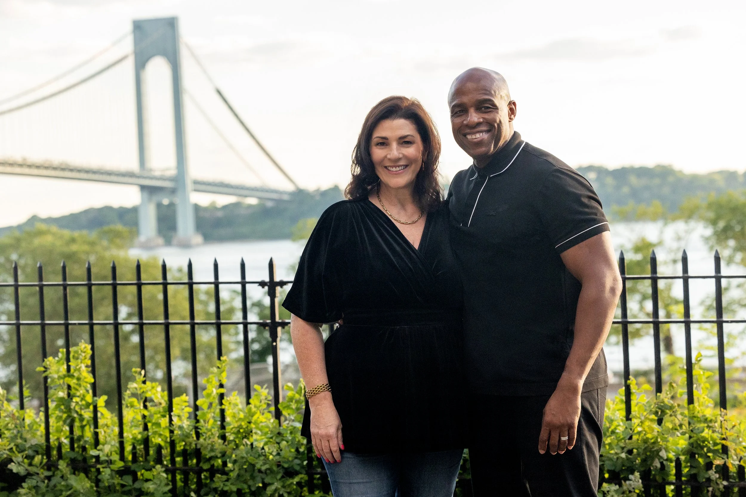 Amy Phillip and Vicario Phillip of The Phillip Team, real estate professionals in Bay Ridge, Brooklyn, near the Verrazzano-Narrows Bridge