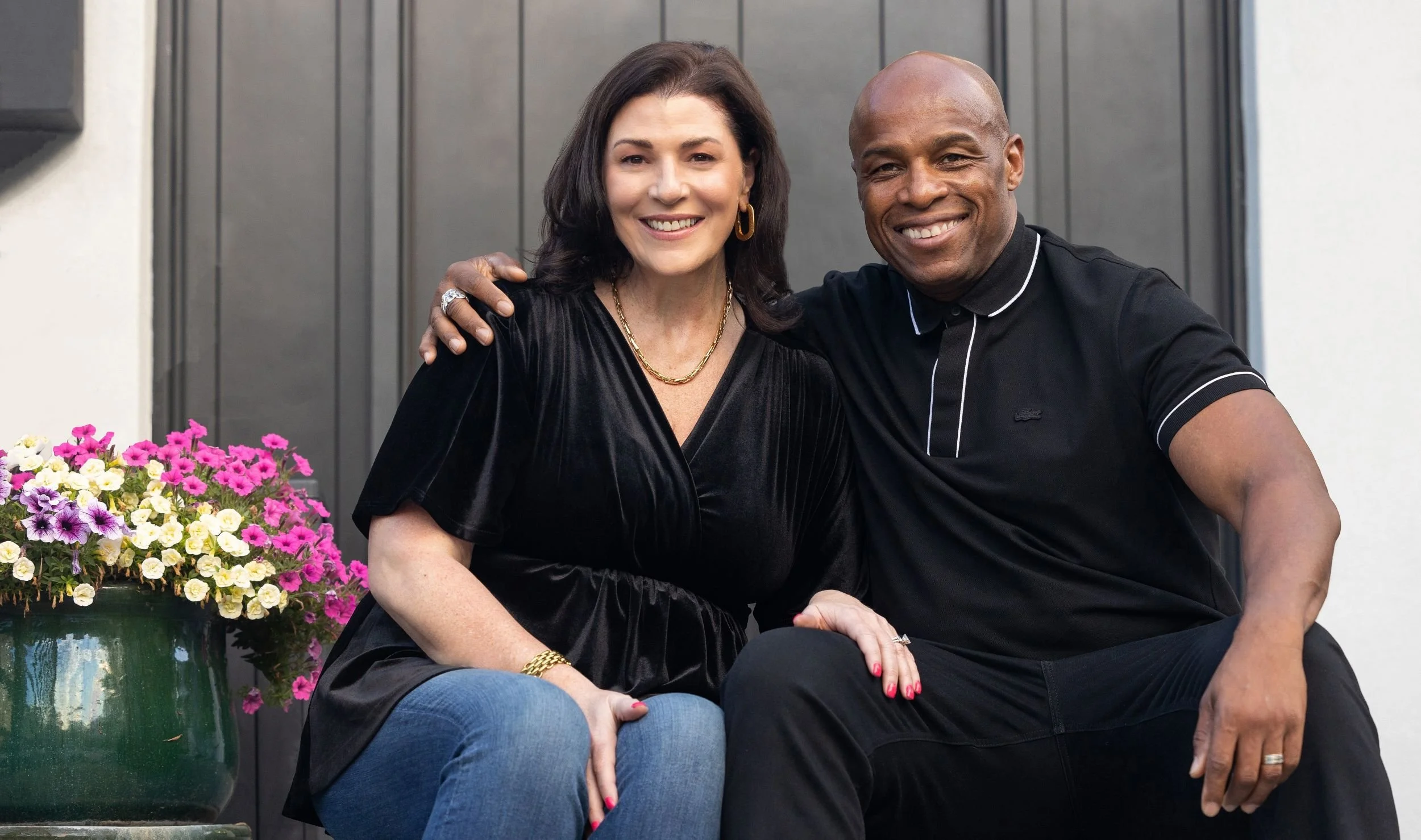 Amy and Vicario Phillip of The Phillip Team at MNS outside a home in Bay Ridge, Brooklyn