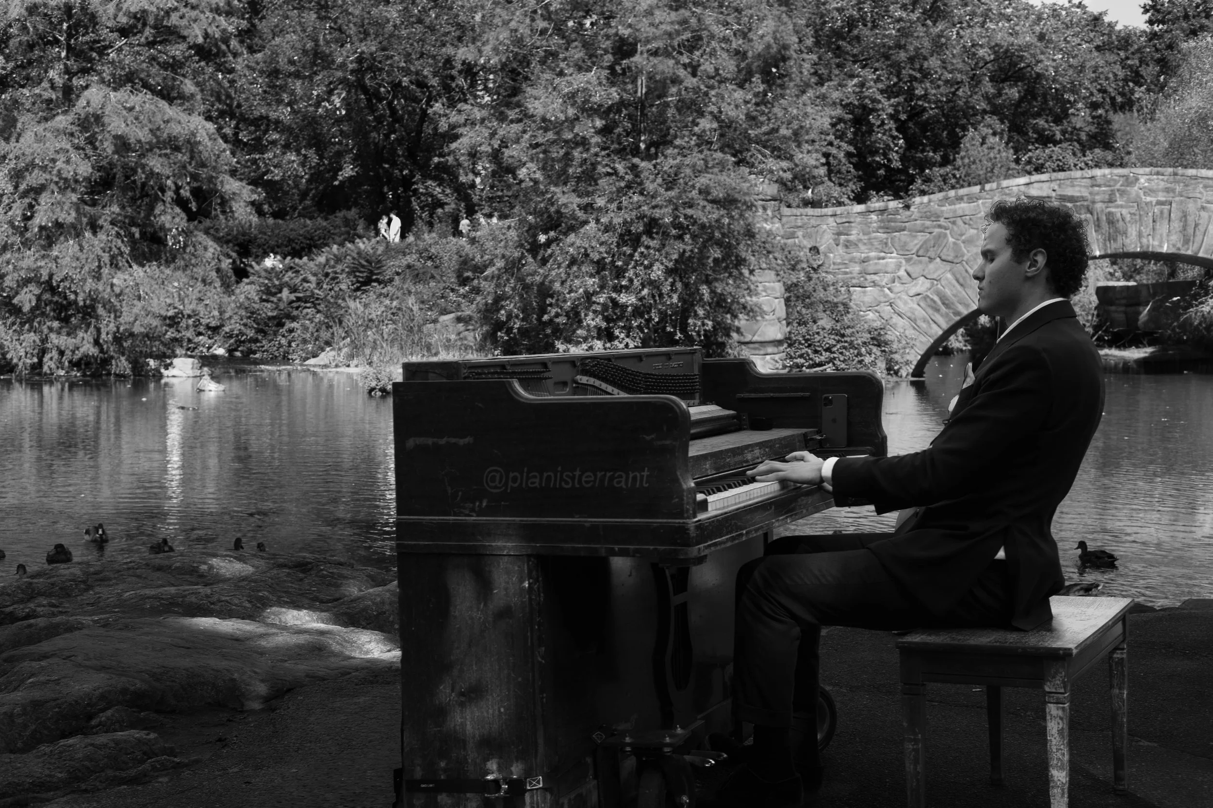 piano man 2 (lovers in the background) B&W-2.jpg
