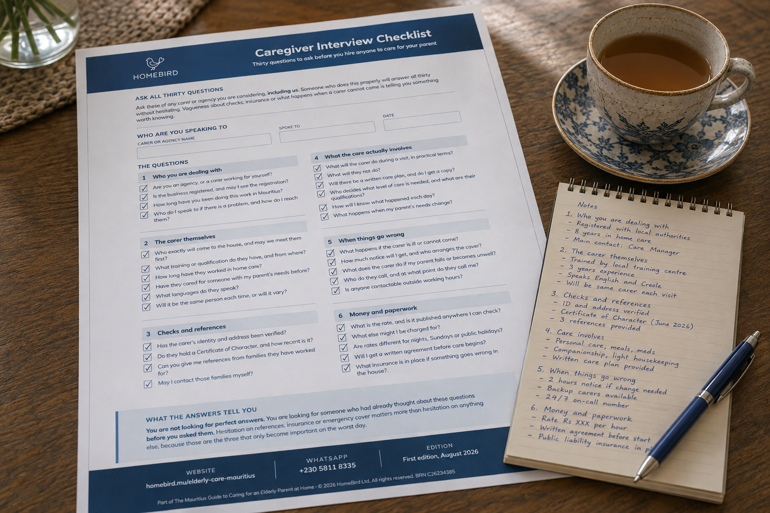 A printed interview checklist with handwritten answers and a pen resting across it