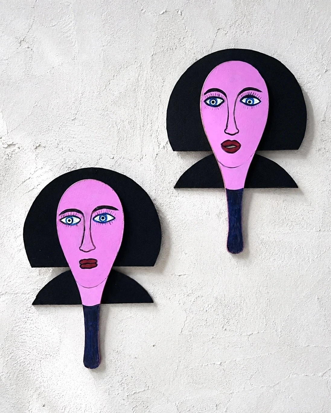 Paint on wooden paddles with attached felt-like elements H 45 x W 30 cm each