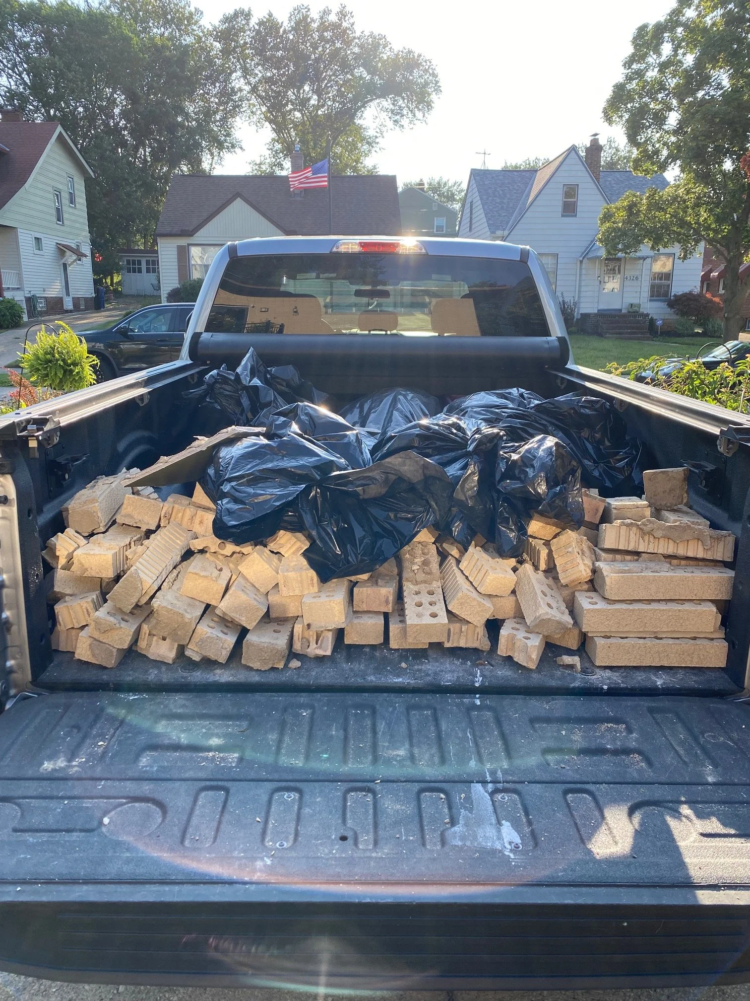 Truck hauling bricks in Parma Ohio during junk removal job
