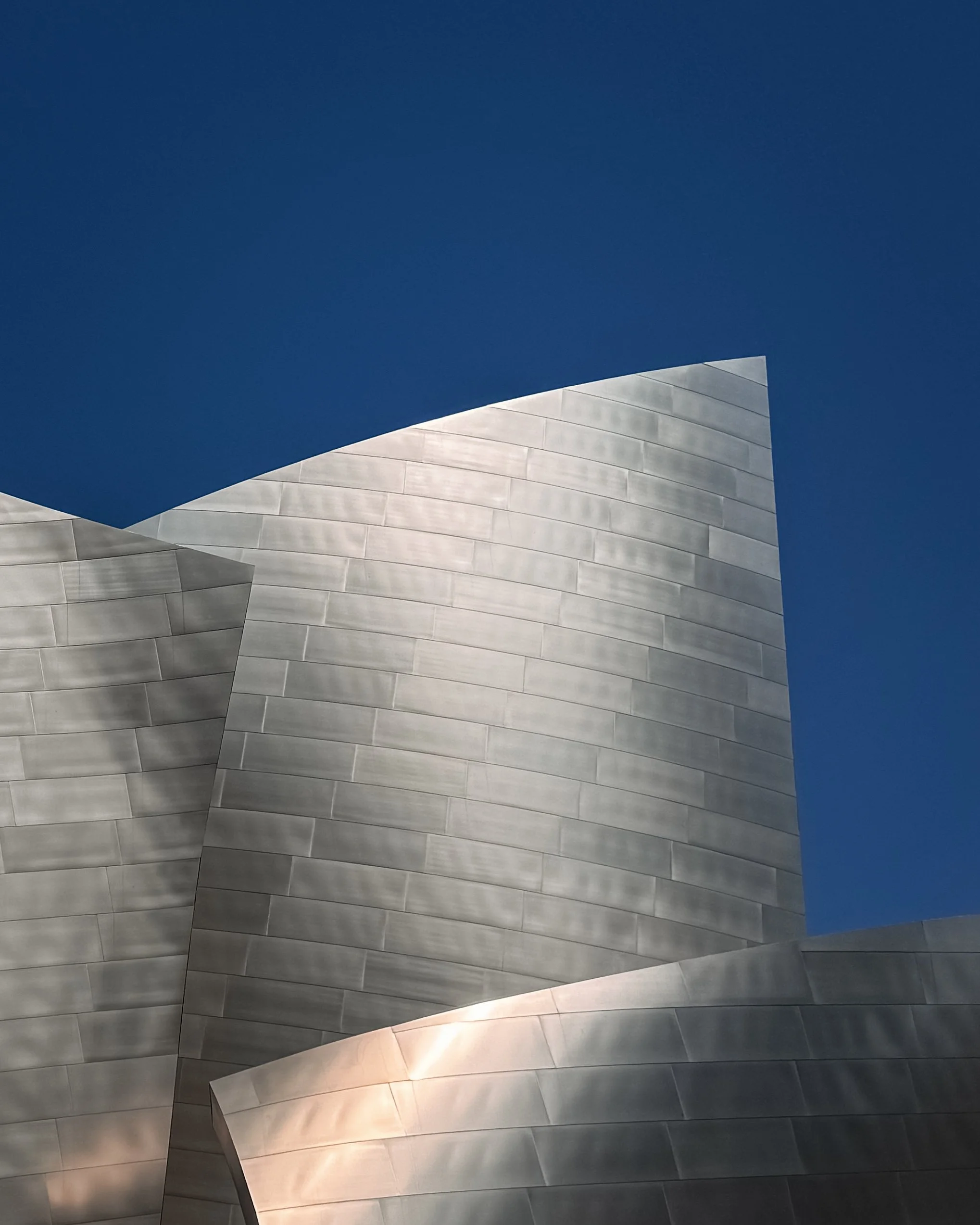 Close-up of the exterior of The Walt Disney Concert Hall in downtown Los Angeles, California, USA, designed by architect Frank Gehry, home of the Los Angeles Philharmonic.