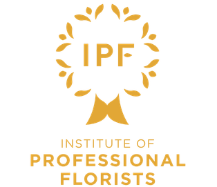 Logo of the Institute of Professional Florists, featuring a gold floral wreath surrounding the initials 'IPF' with the institute's name below.