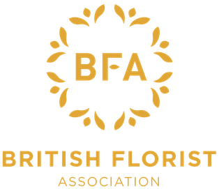 Logo of the British Florist Association with gold floral design and text 'BFA' and 'British Florist Association'.