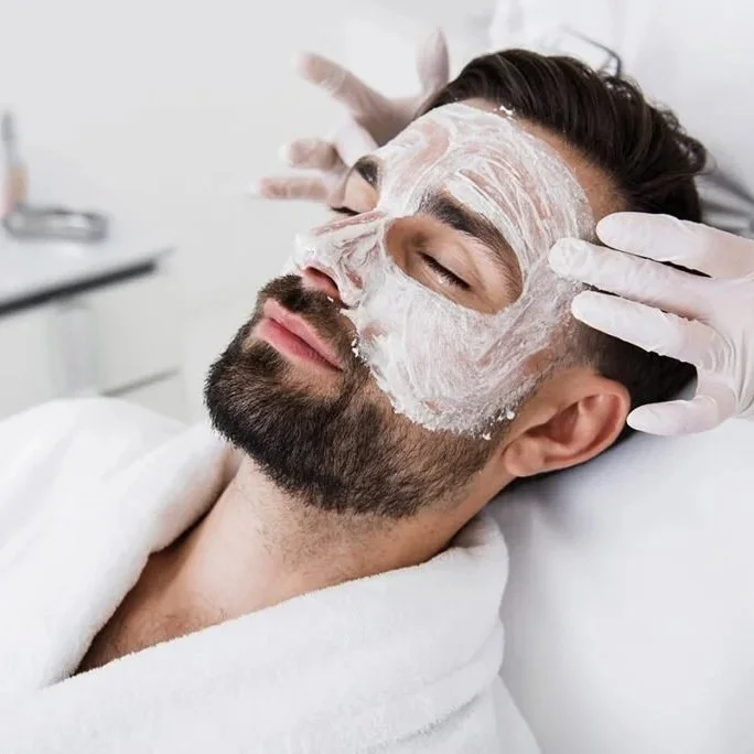 Customized men's facial improving skin texture, hydration, and overall skin health with professional skincare treatments.