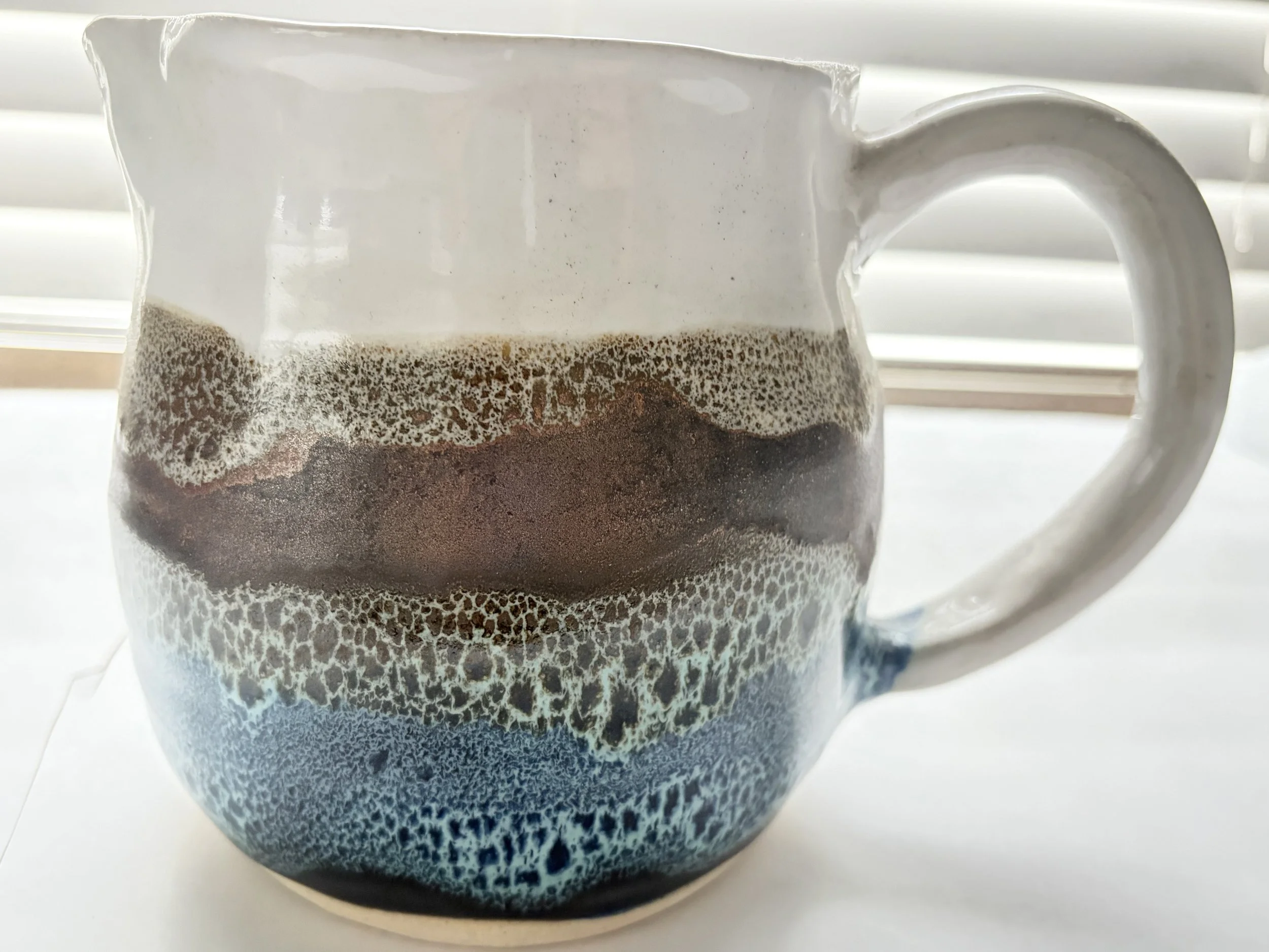 Blue and Copper Pitcher