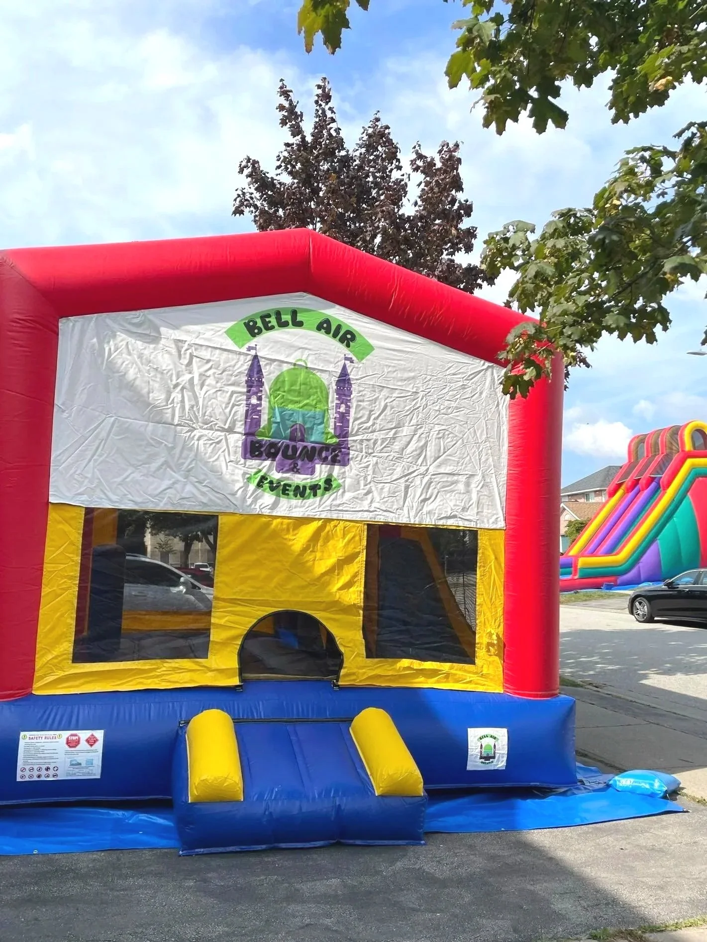 Rainbow Castle with Dual Slide in the background