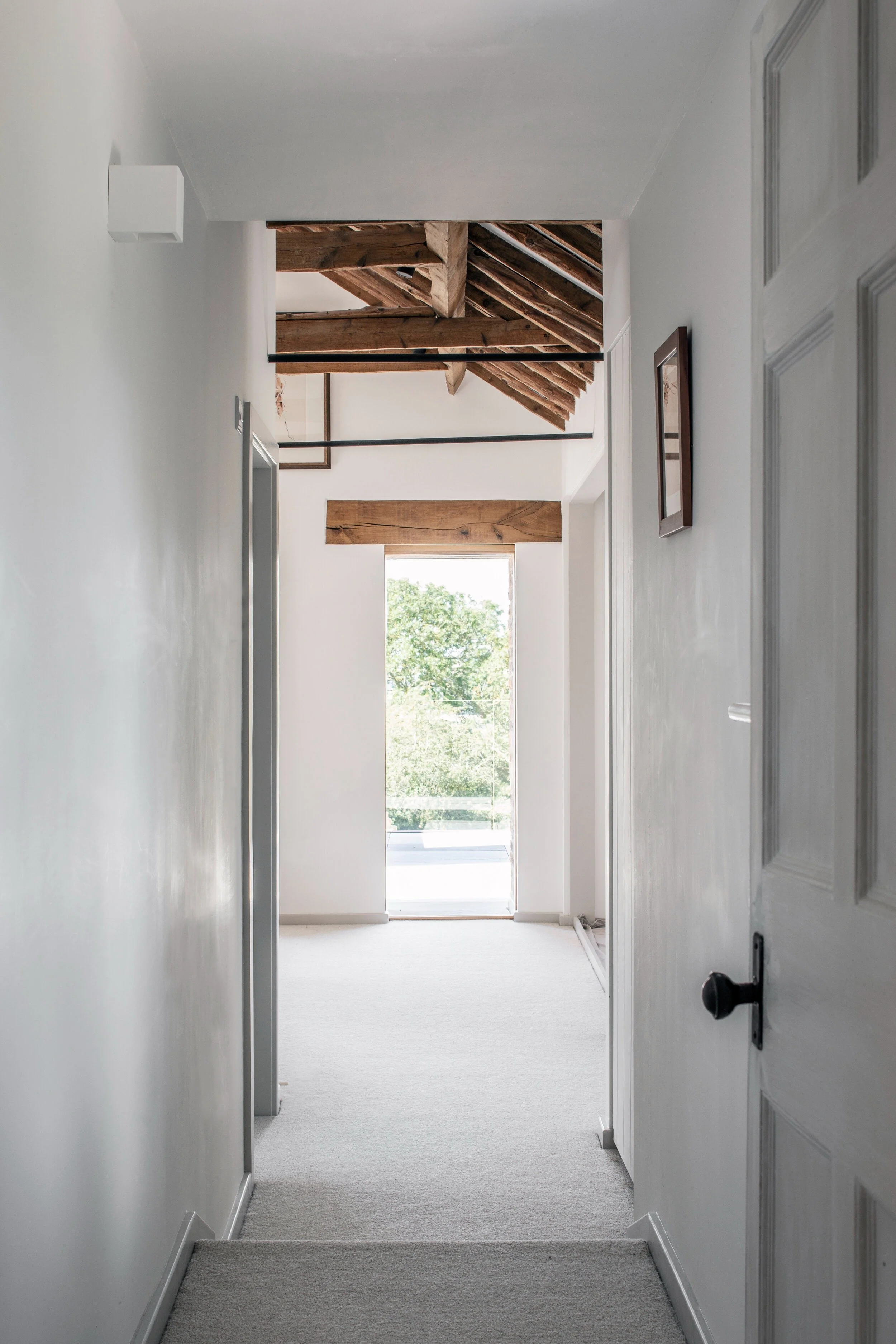 bright-hallway-exposed-beams-loft-style-extension-parchment-works.jpg