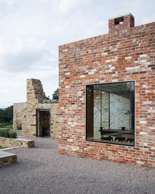 modern-red-brick-dining-room-extension-large-square-window.jpg