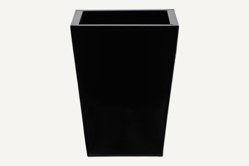 Classic square metal outdoor planter for the garden set on a neutral background