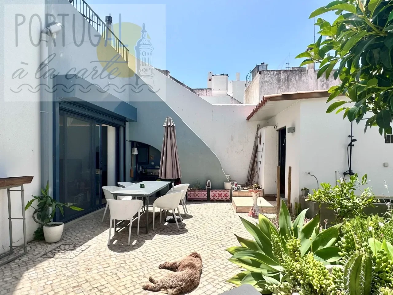 The Buyer Playbook: Renovated Townhouse with Patio and Roof Terrace, Baixa, Algarve, Portugal, €450,000