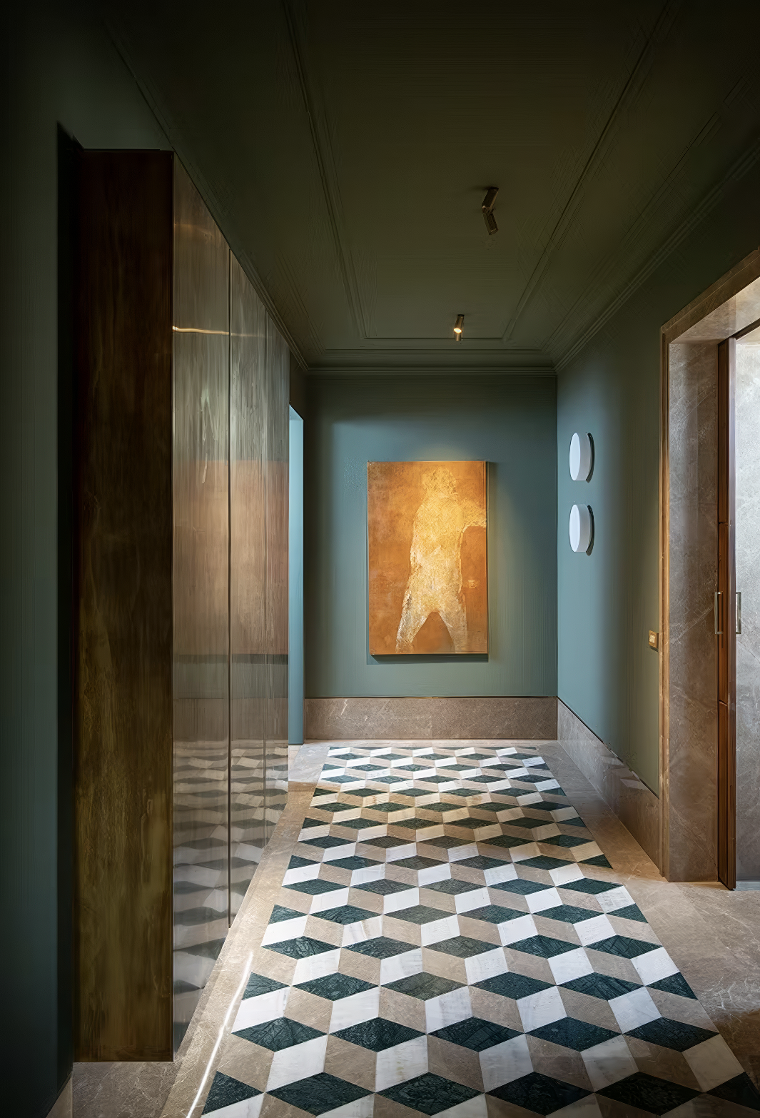 Narrow hallway with cube-patterned flooring and a golden abstract artwork.