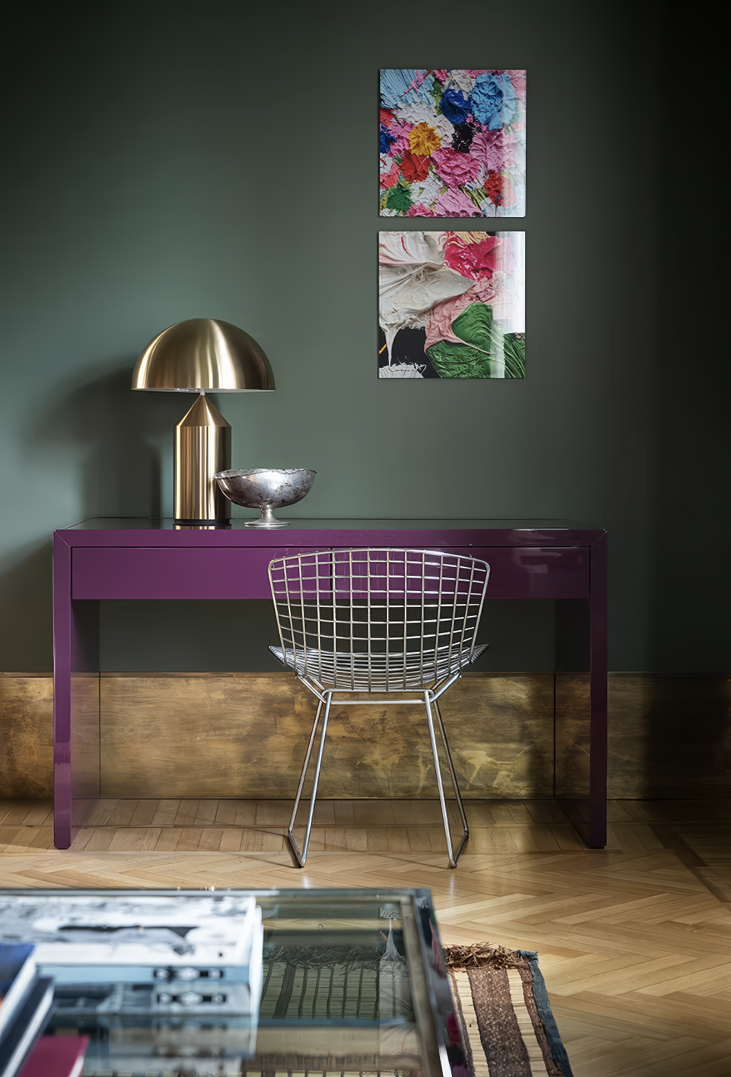 Purple lacquer desk with gold dome lamp and abstract artwork.