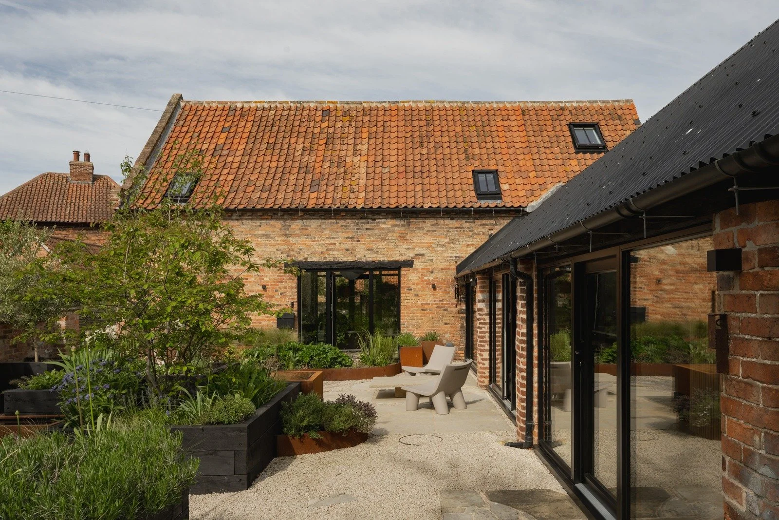 fen-barn-zen-garden-landscaping-and-terracotta-roof.jpg