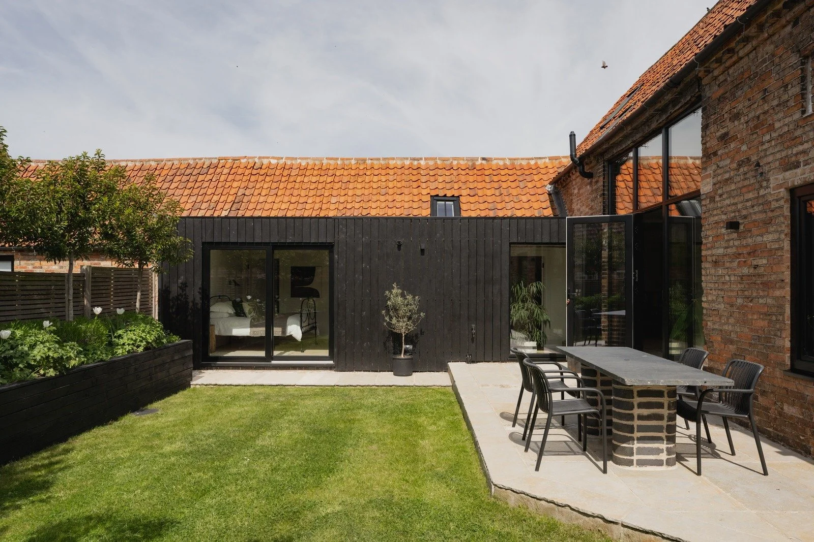 fen-barn-private-lawn-and-black-clad-bedroom-wing.jpg