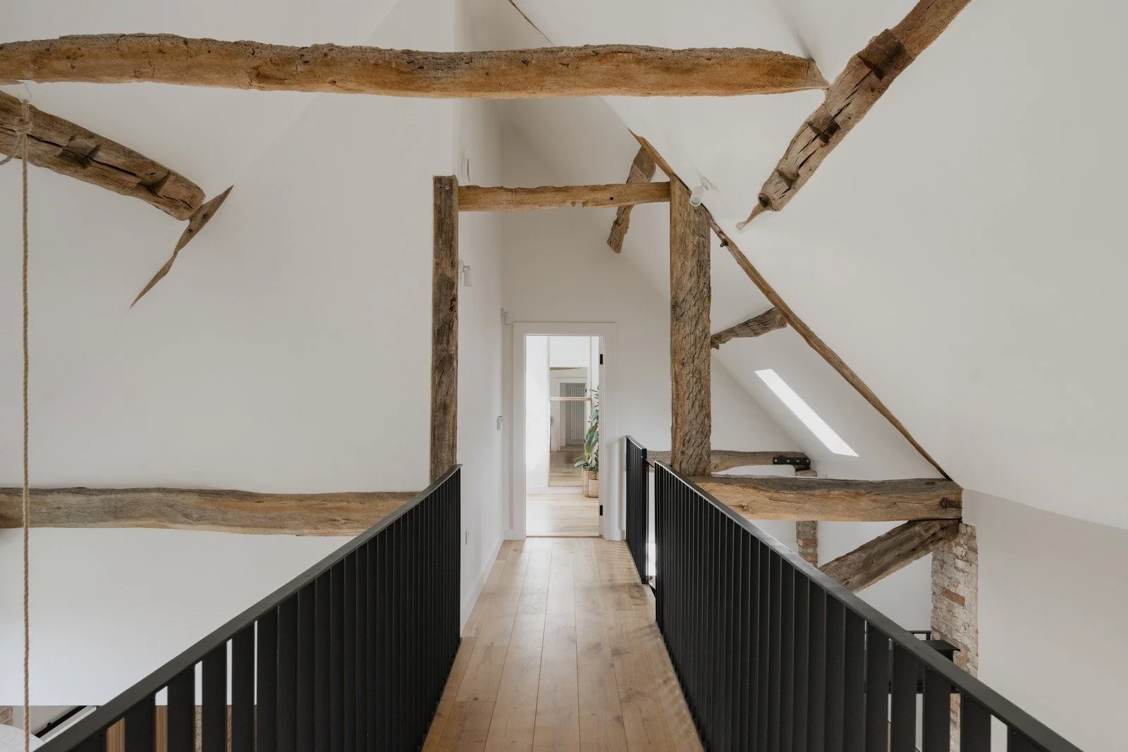 fen-barn-loft-walkway-exposed-beams-gallery-view.jpg