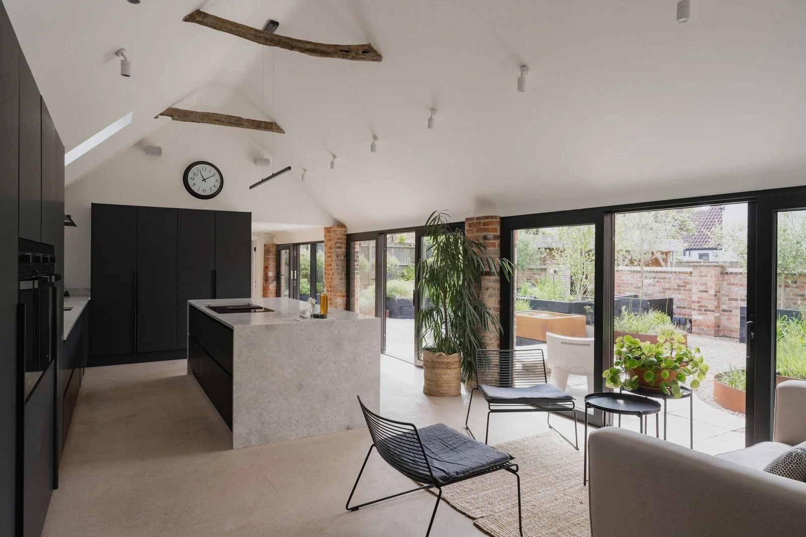 fen-barn-kitchen-view-with-island-and-garden-light.jpg
