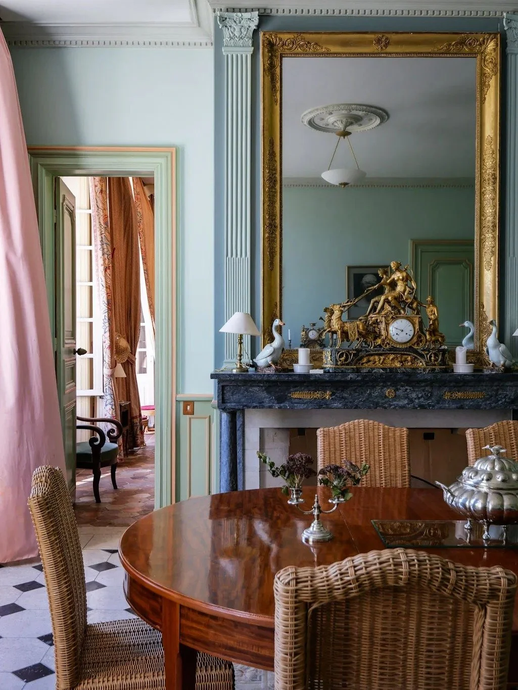 french-chateau-dining-room-gilded-mirror-fireplace-france.jpg