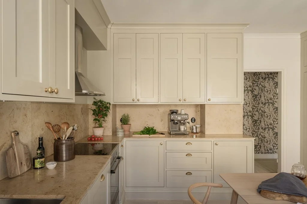 Minimalist Scandinavian Kitchen with Coffee Station and Stone Countertops