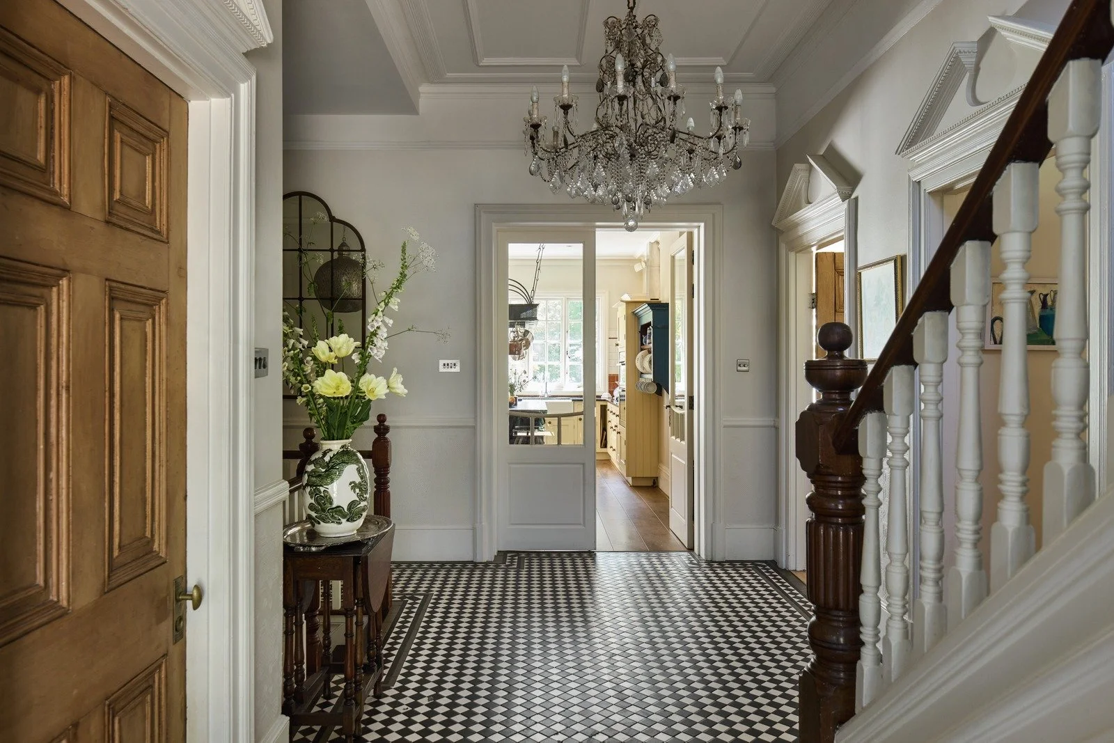 victorian-entryway-with-black-white-checkered-floor-and-crystal-chandelier-london.jpg