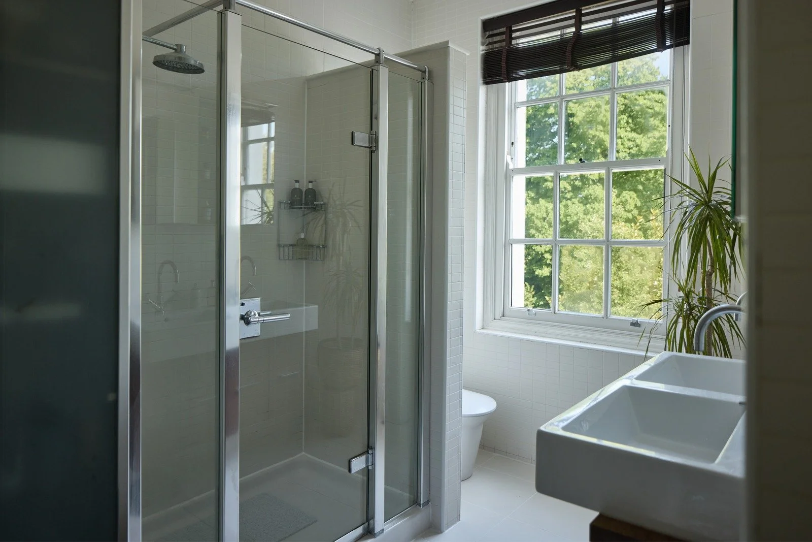 victorian-modern-bathroom-with-glass-shower-and-double-vanity.jpg