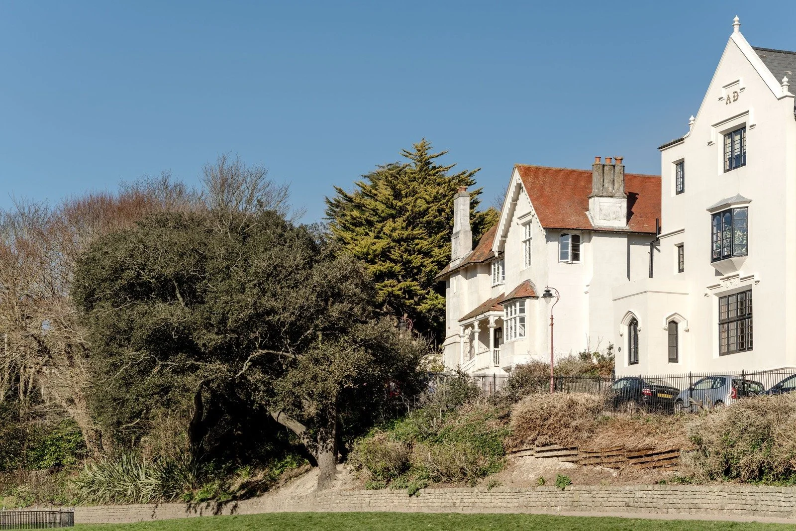 Front view, facing the beach, of Maze Hill’s double-fronted Victorian façade with Gothic revival elements