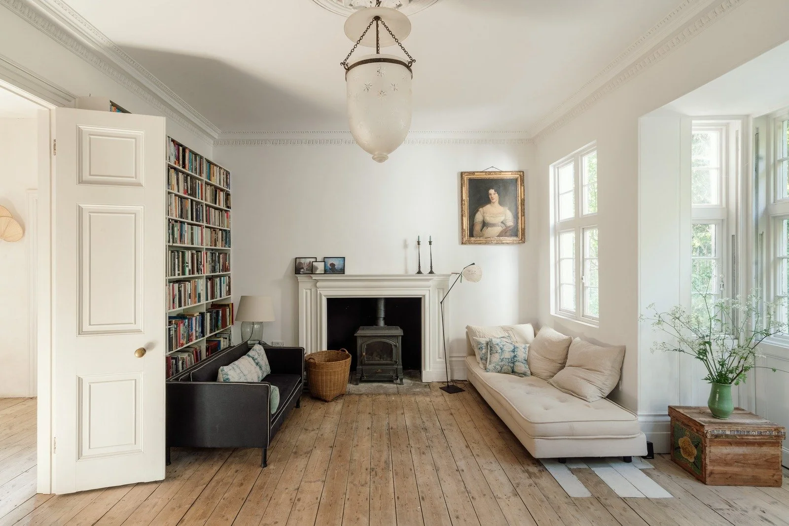 Upstairs library reception room with fireplace