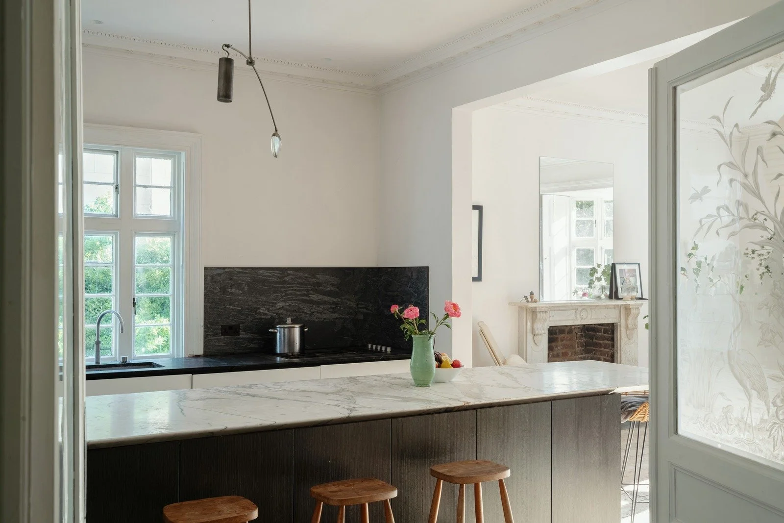 Upstairs kitchen area featuring the island and views to the garden
