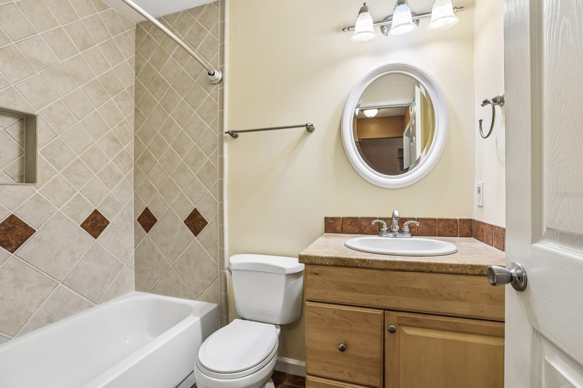 Bedroom #2 has a completely remodeled bathroom with a tub and shower.