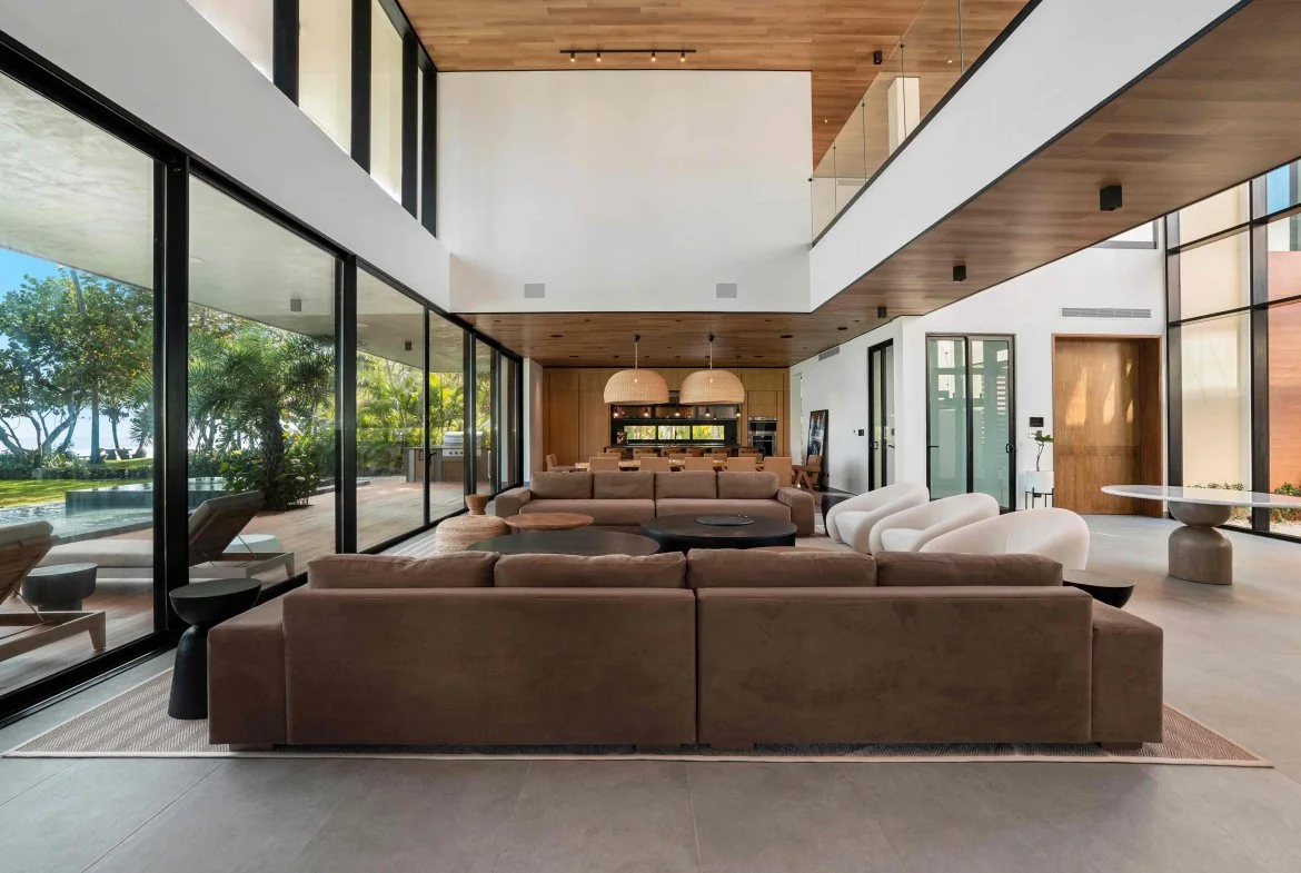 Modern luxury villa with a spacious open-concept living room and contemporary interior design.