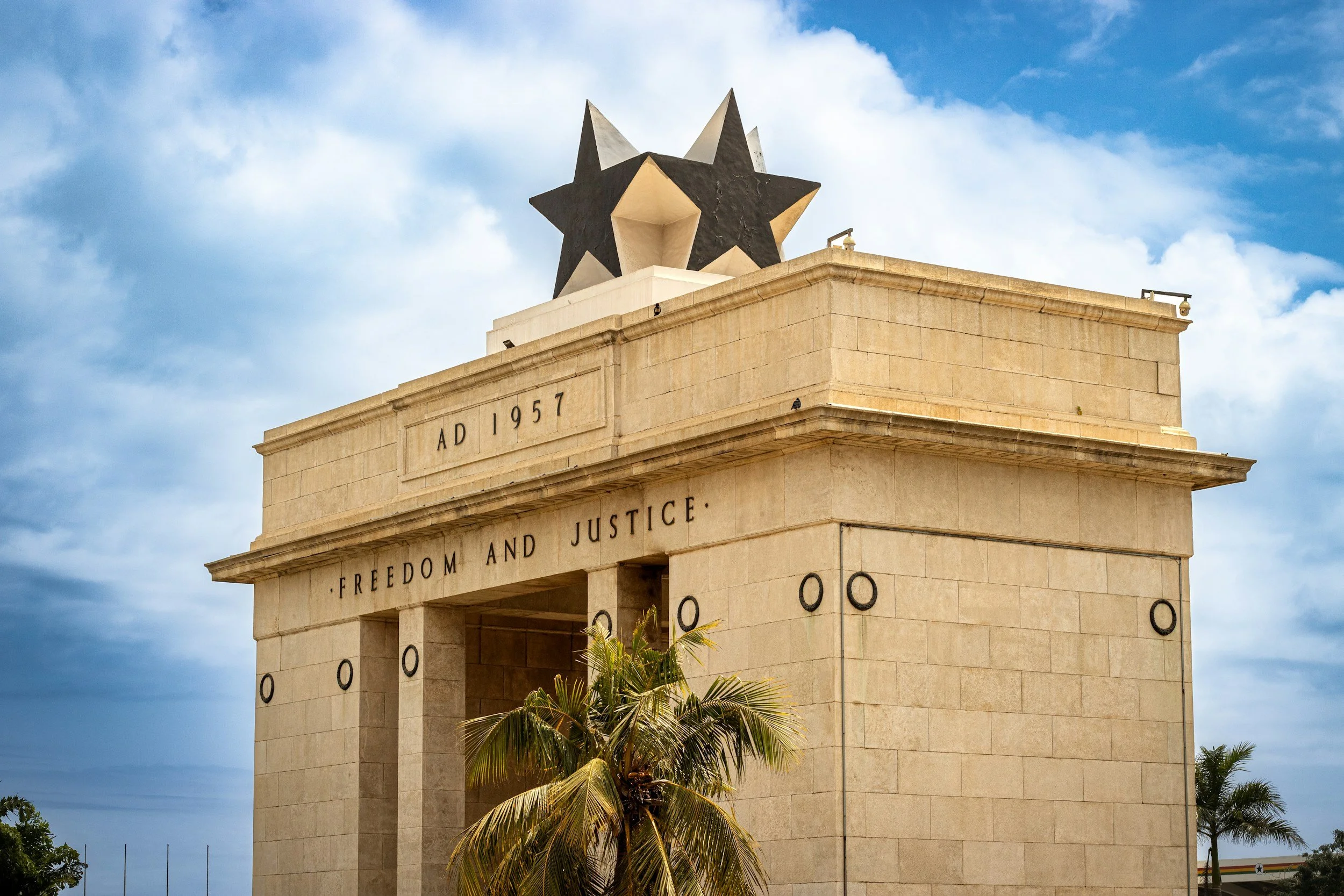 Independence Arch in Accra, Ghana, representing trusted visa guidance and relocation services by ACQUAMENS.