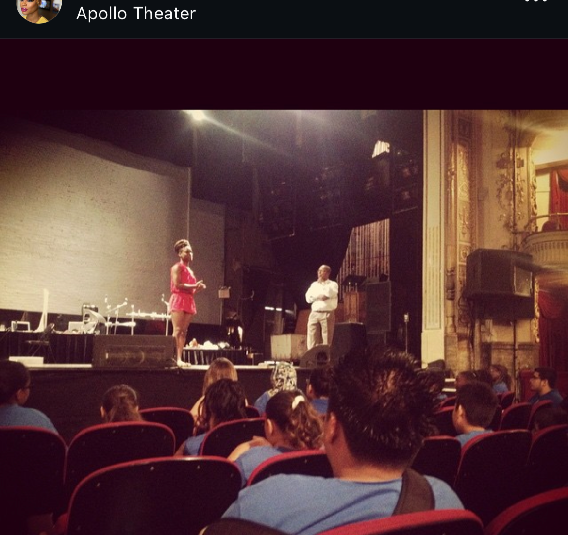 Audience gathered at the historic Apollo Theater to celebrate a life through storytelling, music, and shared remembrance during a memorial tribute.