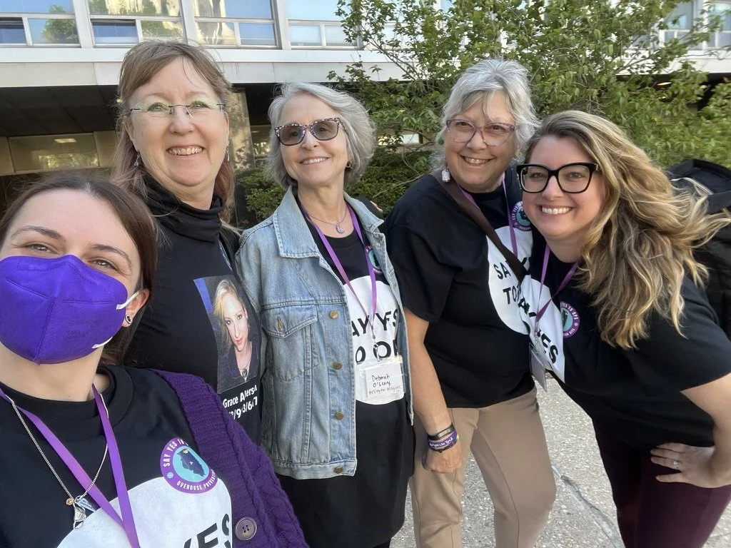Chelsea Laliberte Barnes with addiction and recovery activists advocating for overdose prevention and naloxone access in Springfield, Illinois