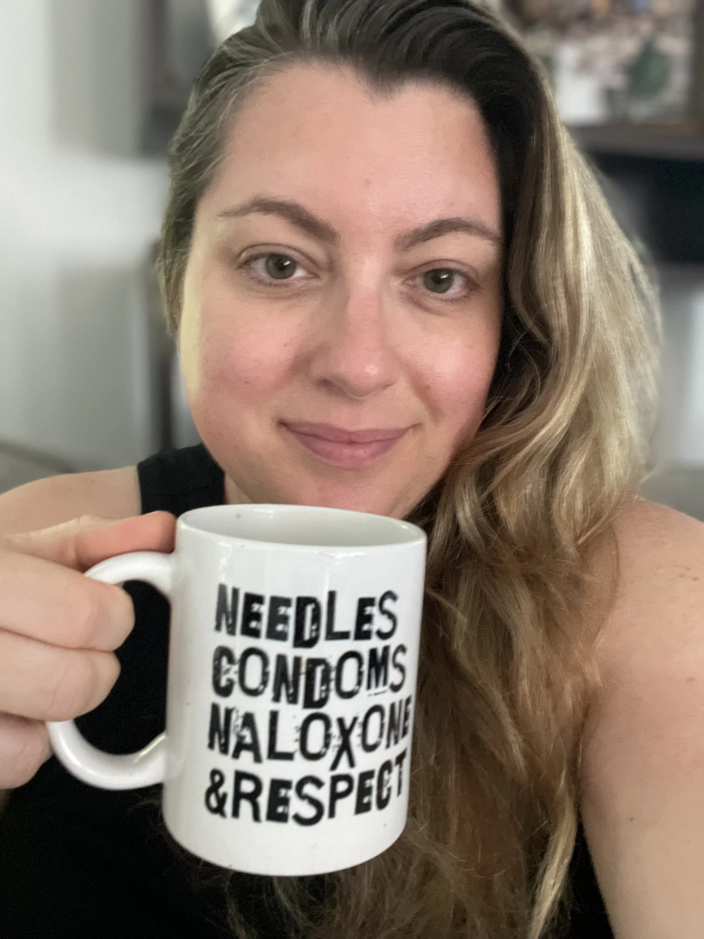 Chelsea Laliberte Barnes, holding her favorite coffee mug