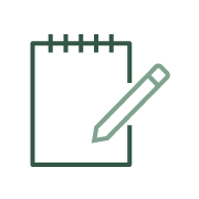 A notepad with a pencil resting on it.