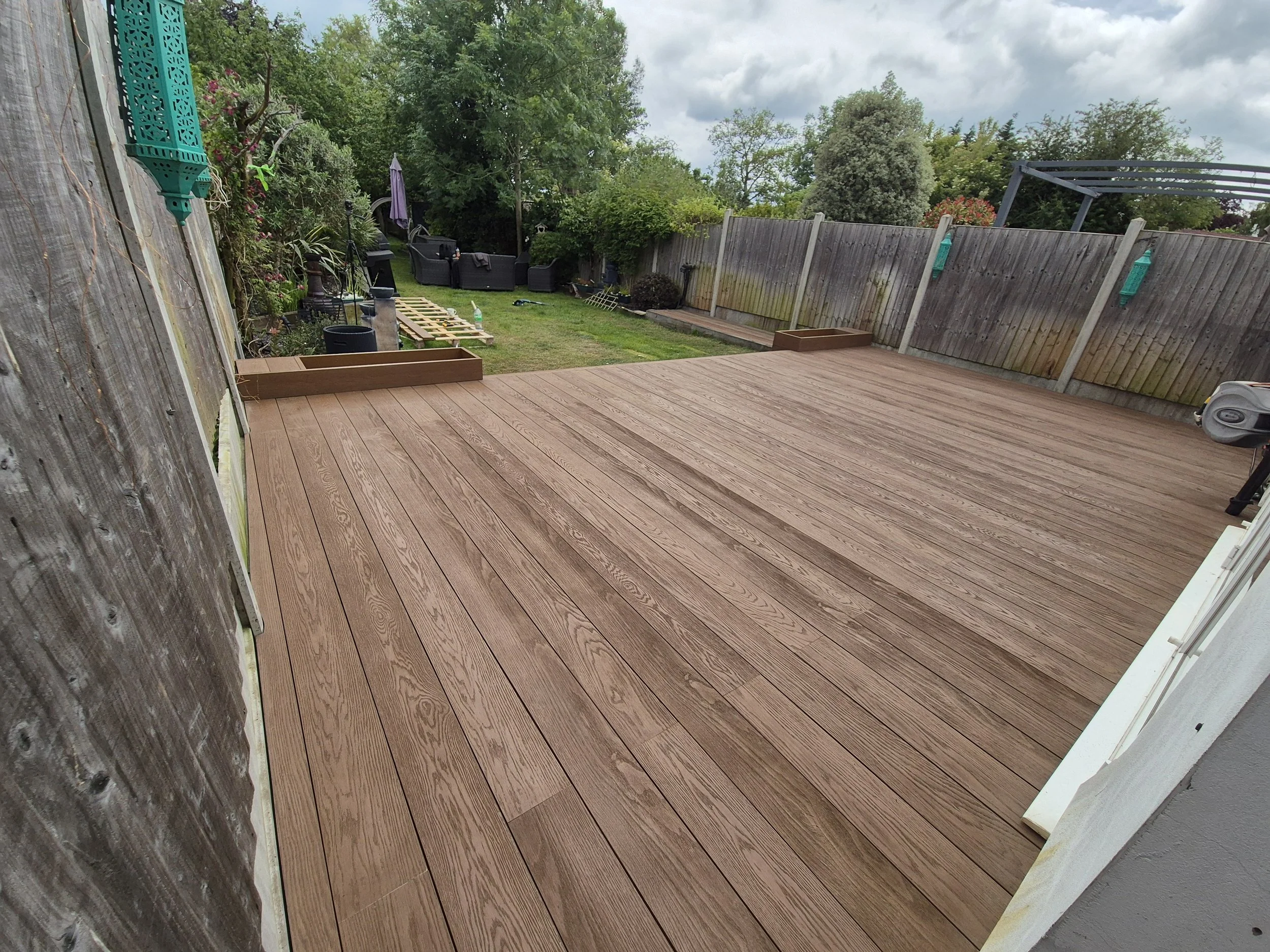 Golden Oak Millboard Decking with Integrated Planters Romford.jpg