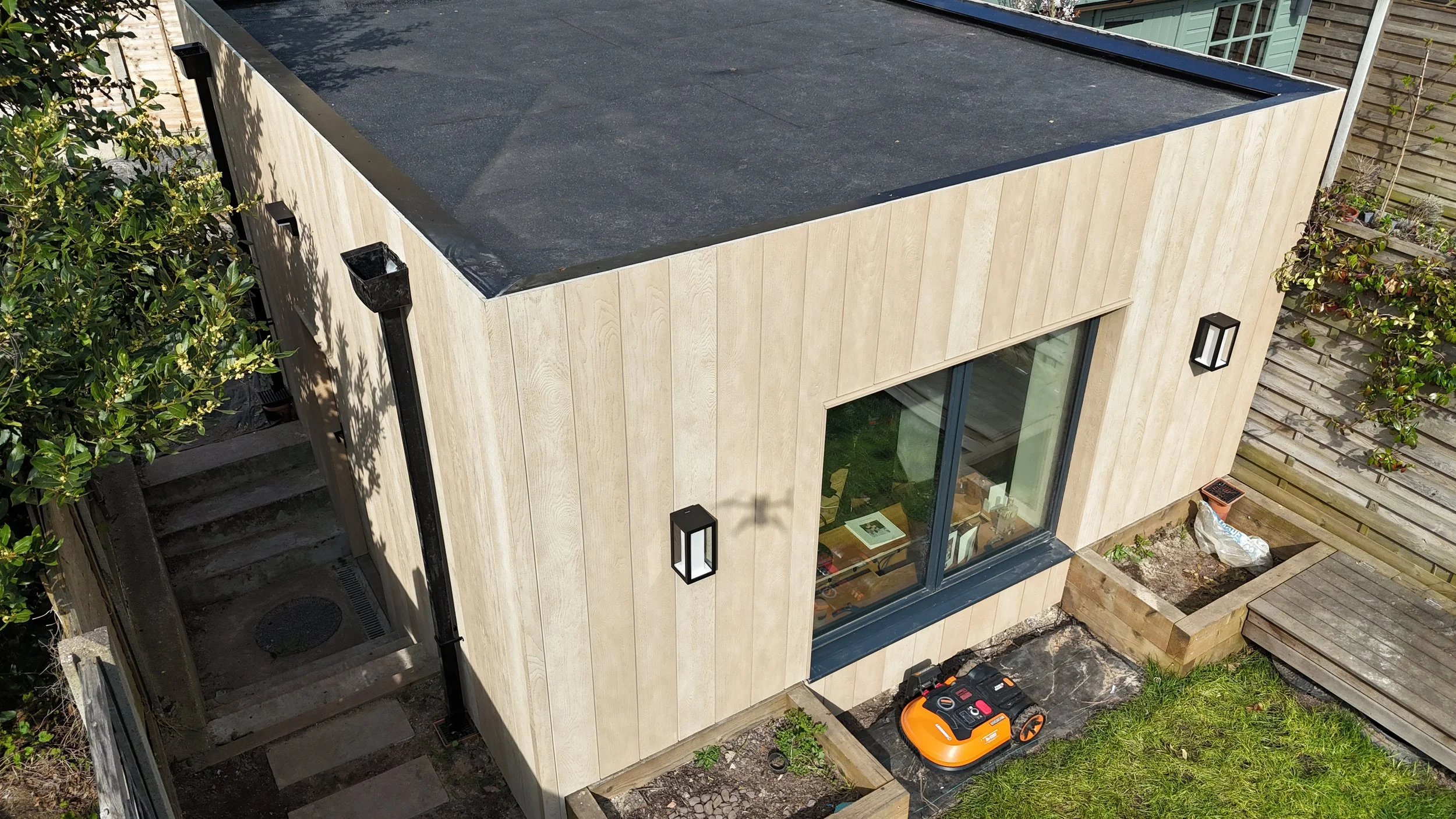 Millboard Envello Cladding in Golden Oak London.JPG