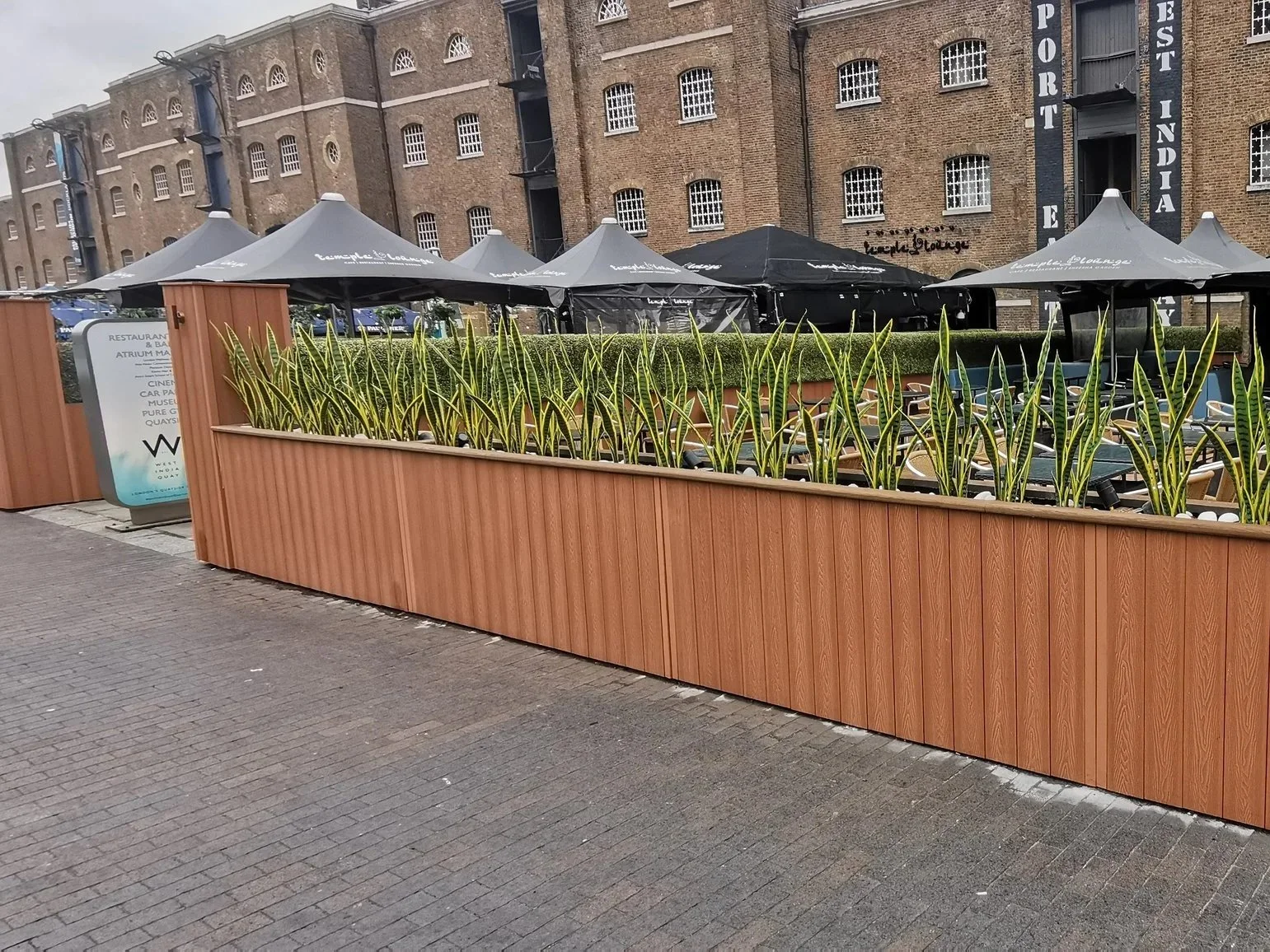 Millboard Decking & Bespoke Planters Canary warf.jpg