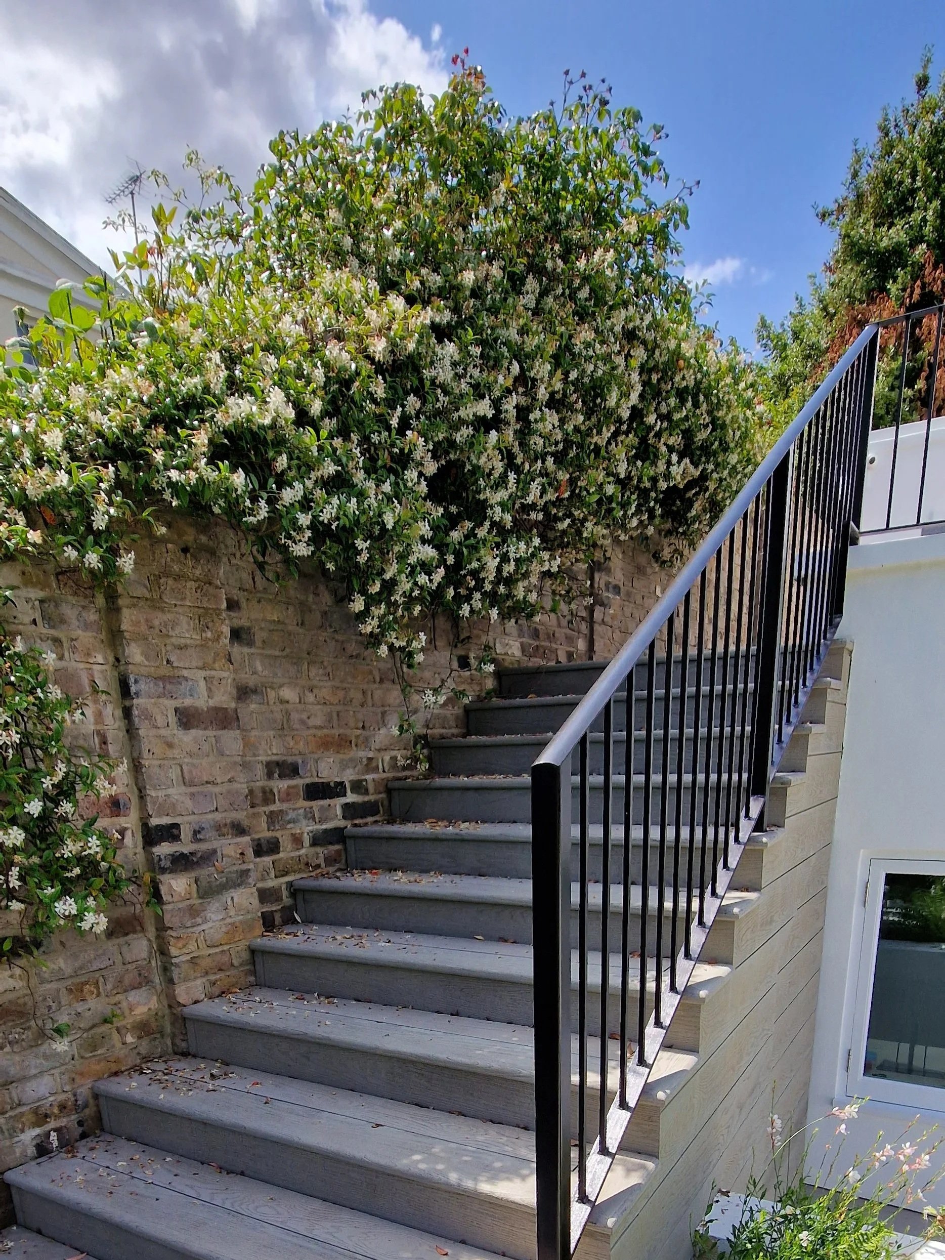 Millboard decking with ballustrades central london.jpg