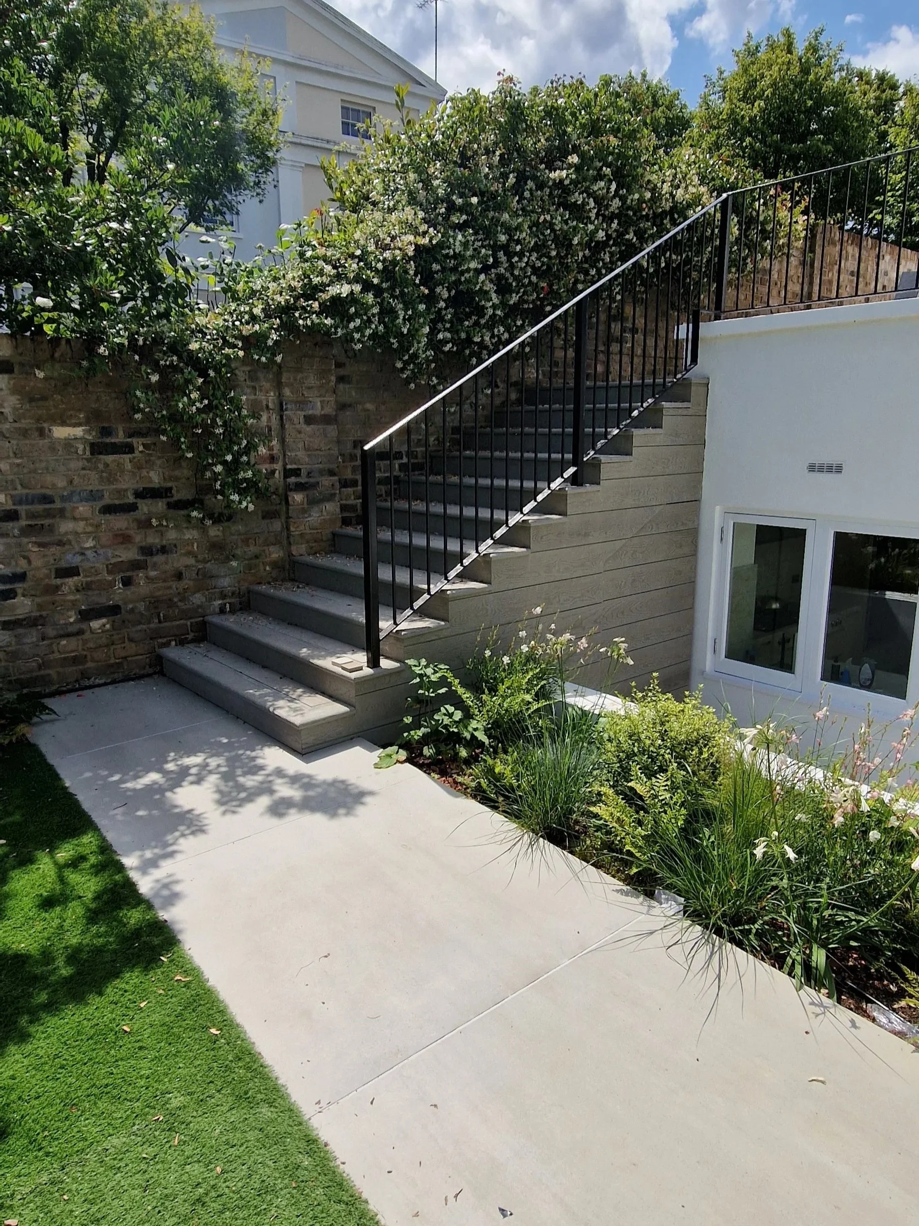 Millboard decking with ballustrades central london.jpg