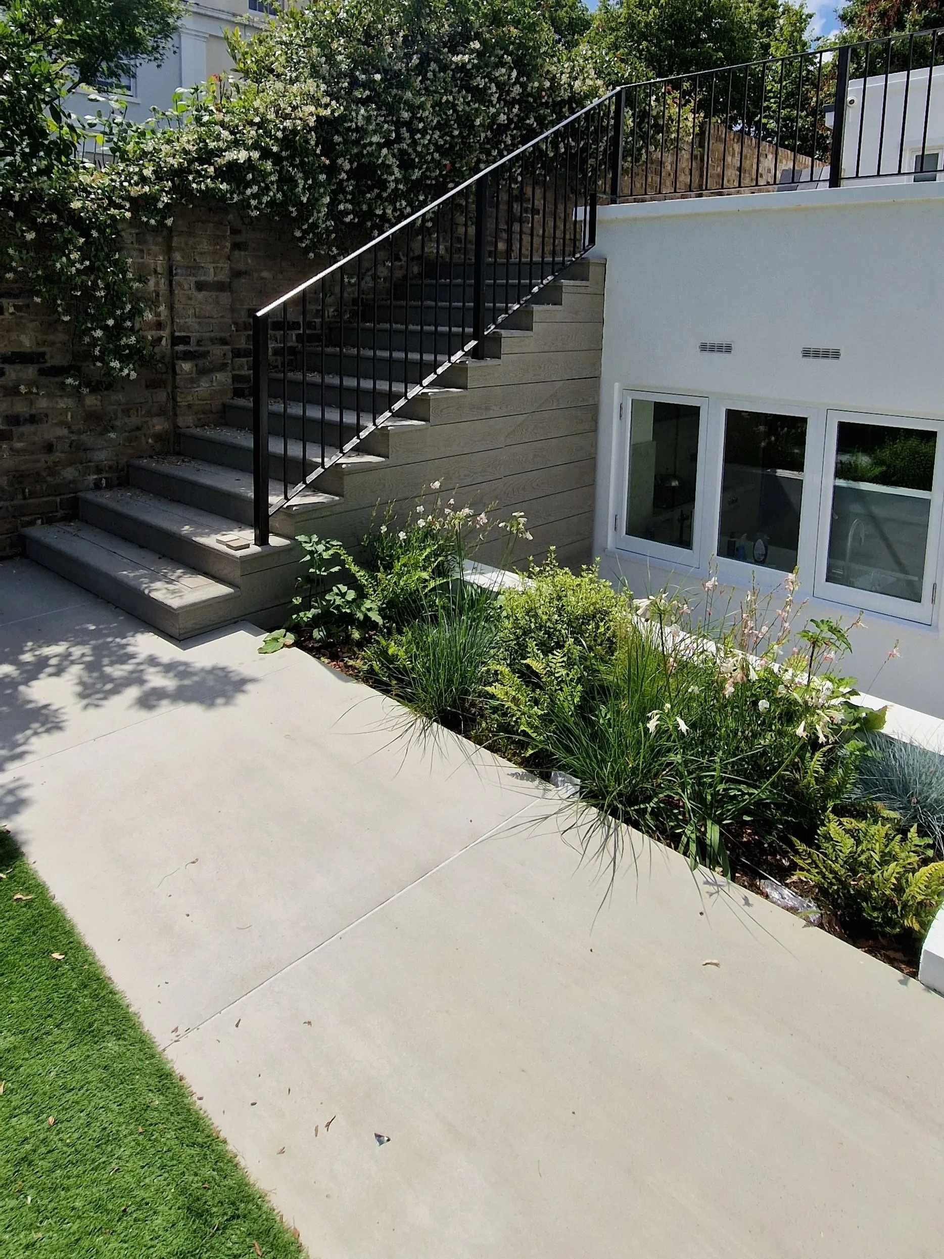 Millboard decking with ballustrades central london.jpg