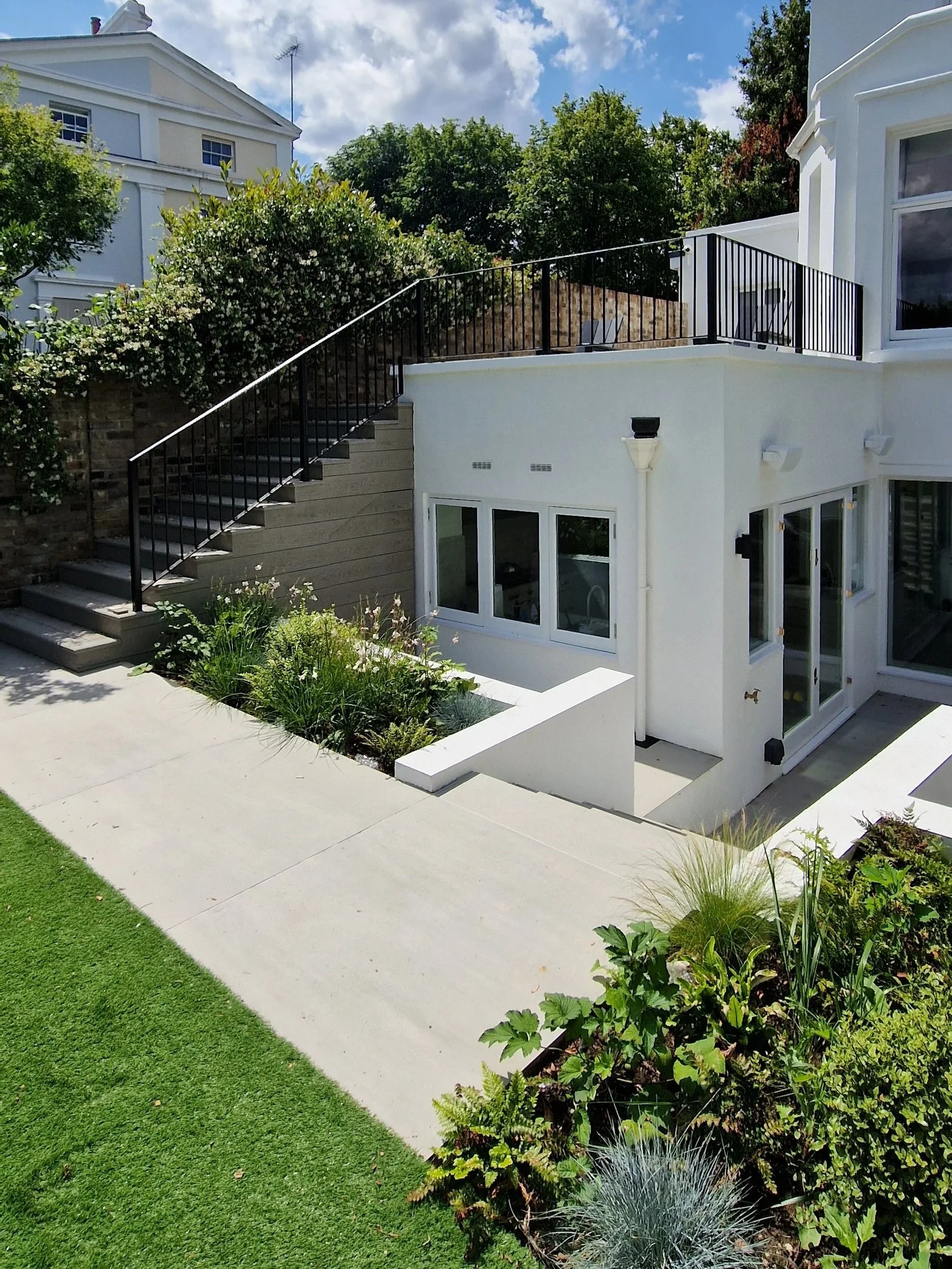 Millboard decking with ballustrades central london.jpg