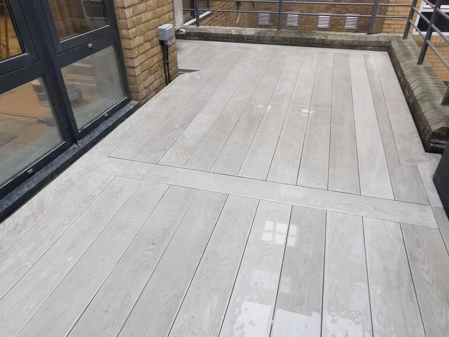 Millboard Decking, Steel Pergola & Privacy Screen Central London.jpg