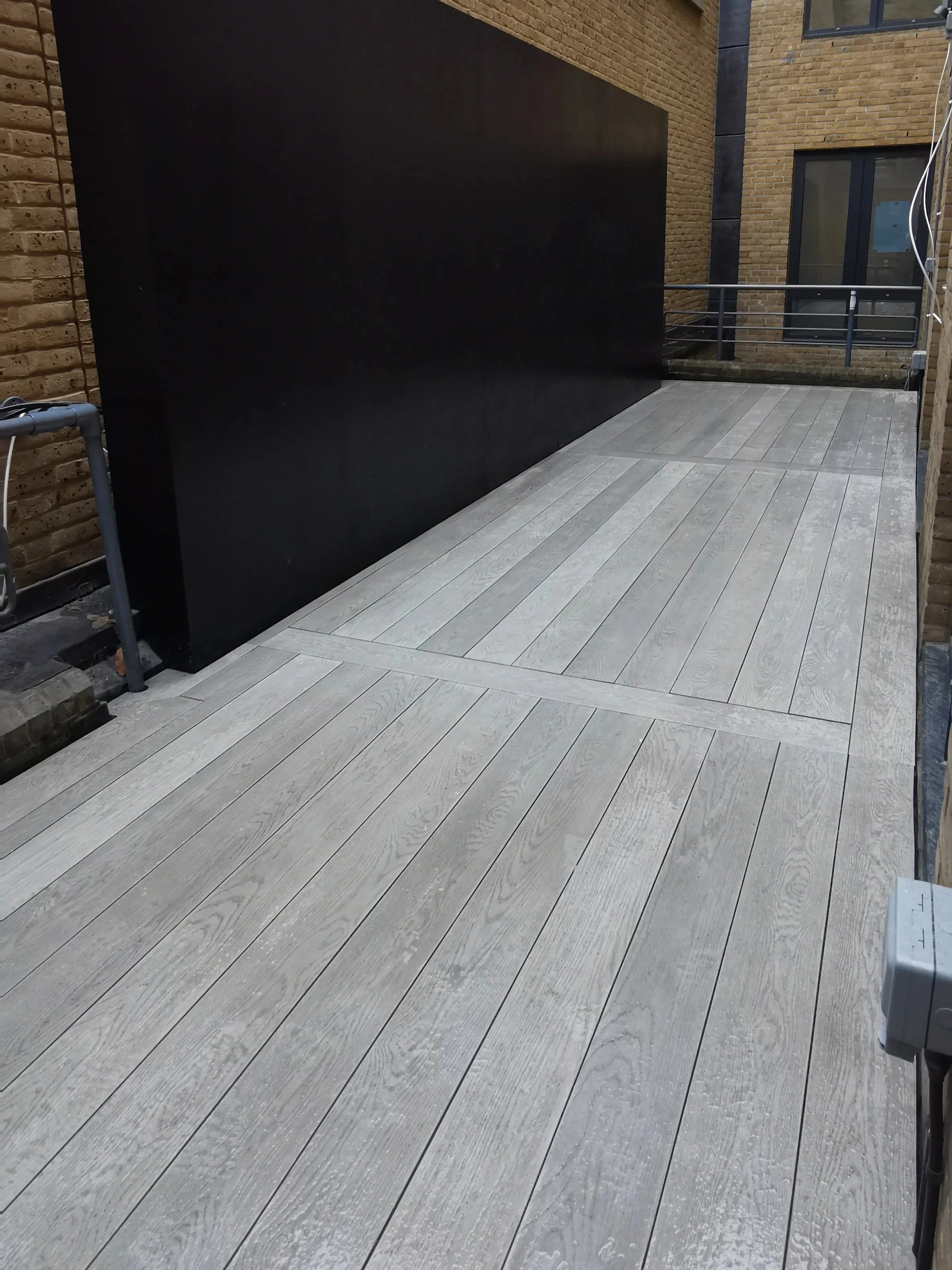 Millboard Decking, Steel Pergola & Privacy Screen Central London.jpg